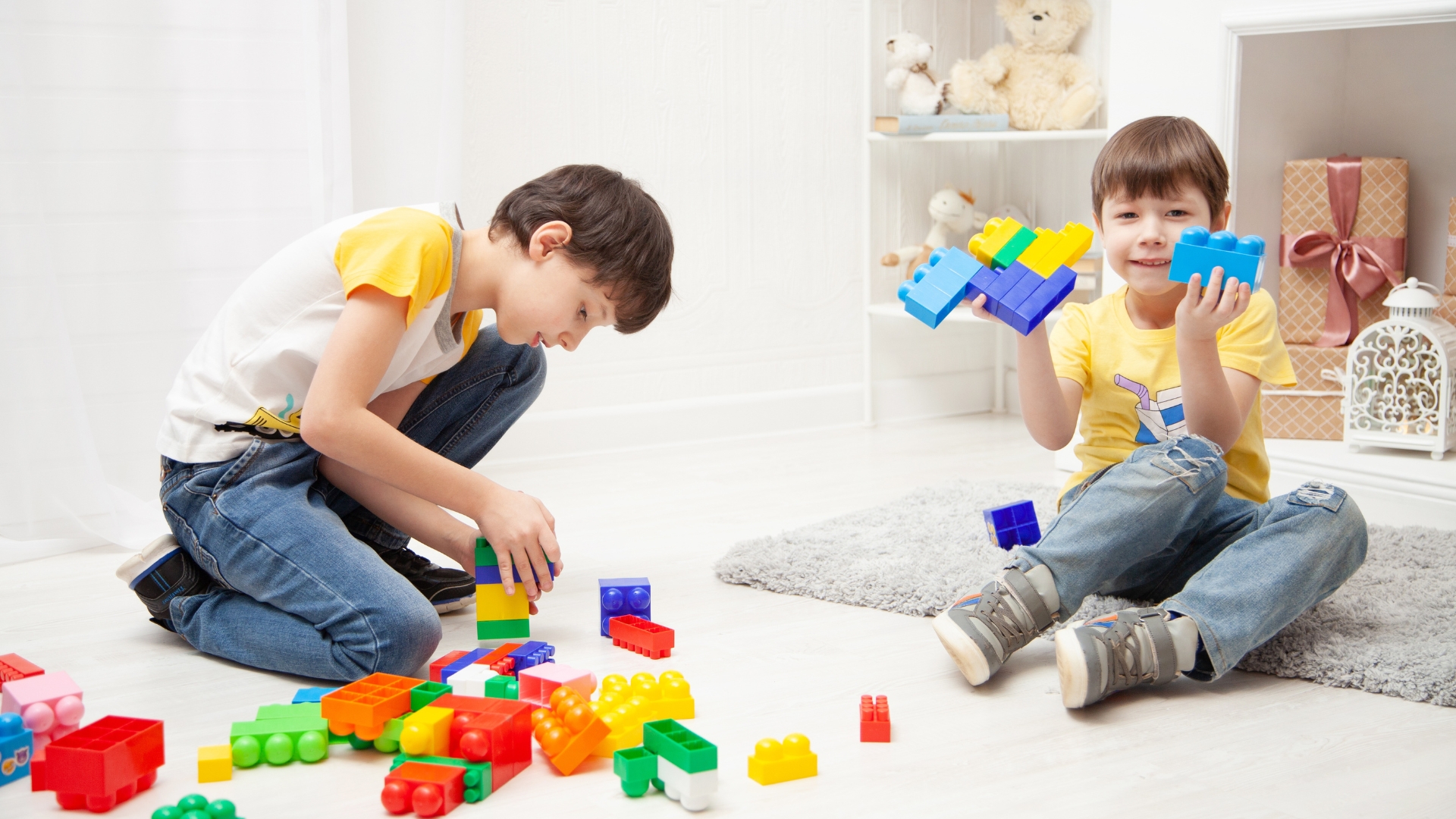 Parent reviewing a developmental milestones checklist with their toddler