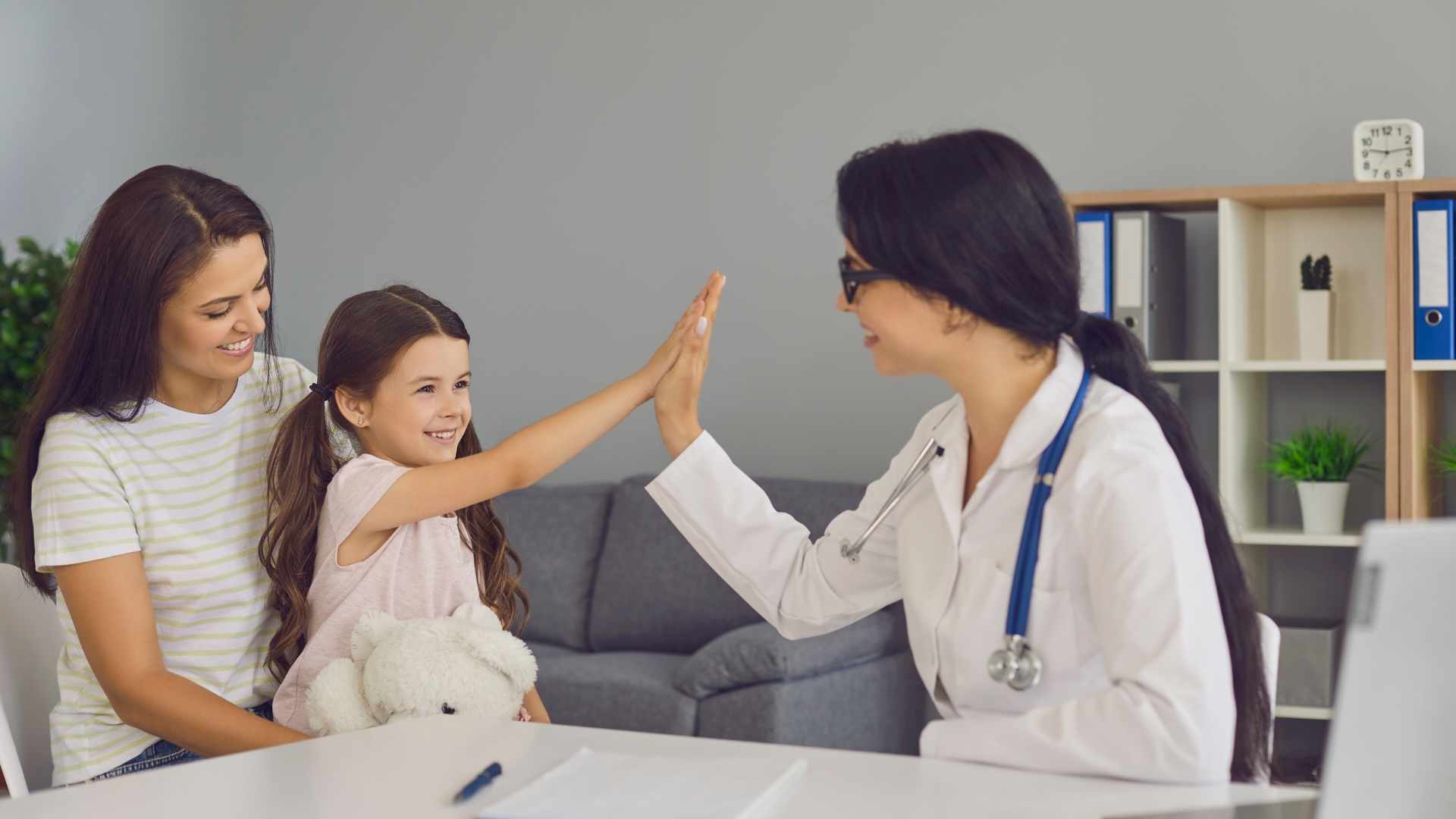 Occupational therapist guiding a child through a fine motor activity in Thousand Oaks