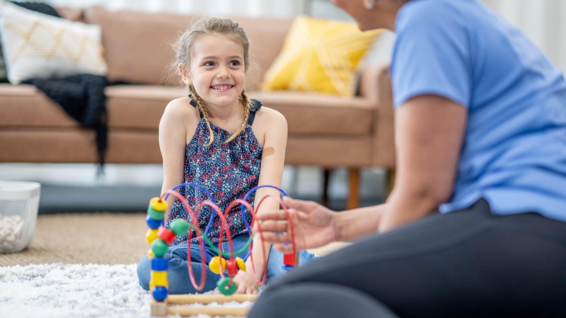 Pediatric speech therapist working with an Oak Park child during an in-home session