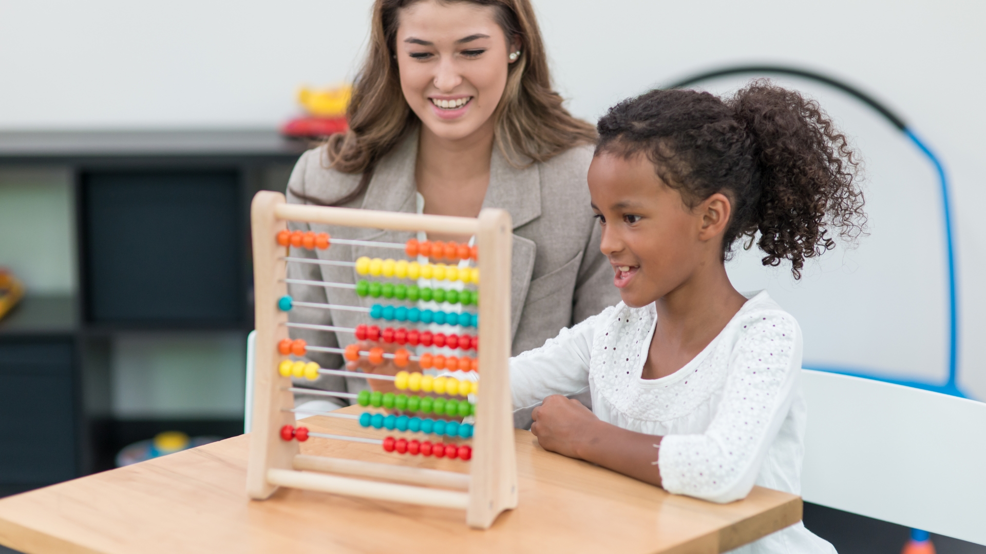 Pediatric occupational therapist helping a child build daily living skills in Westlake Village