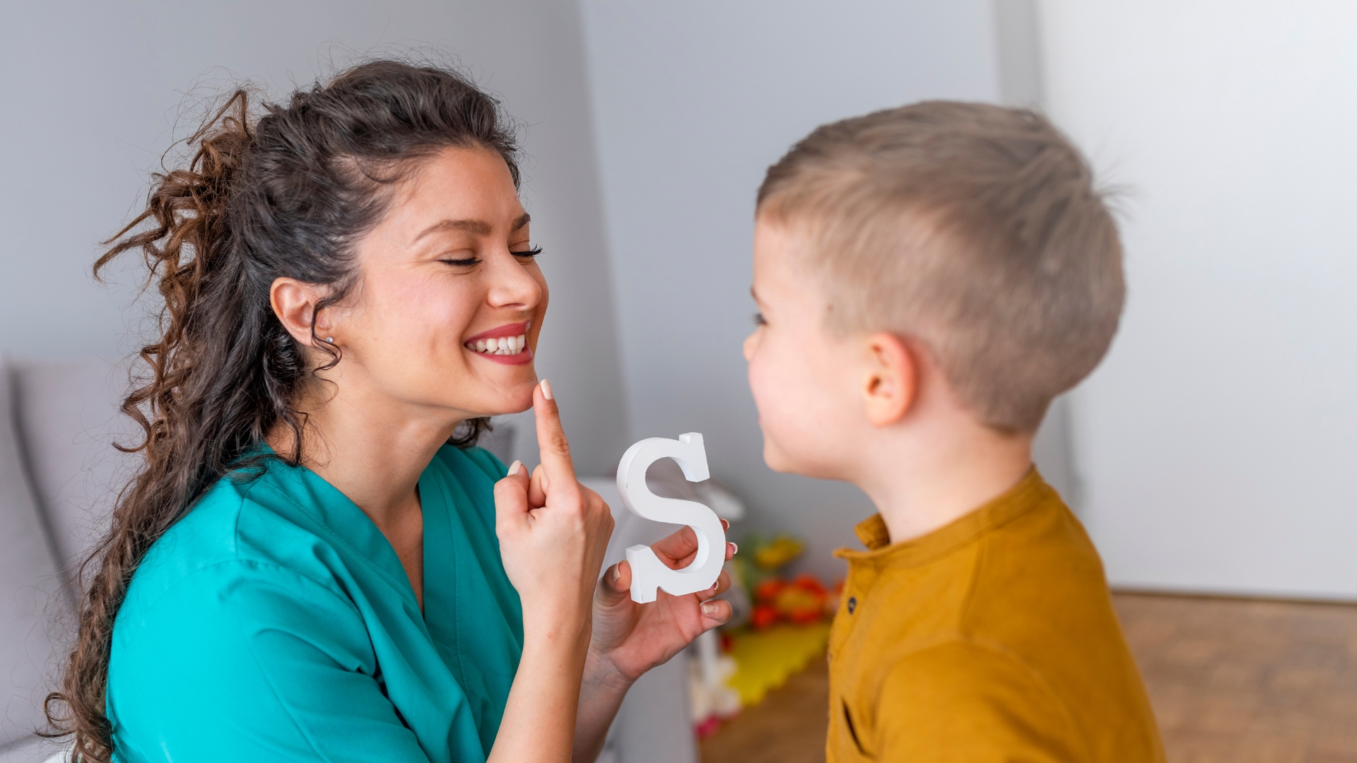 Parent and child in a speech and occupational therapy session in Ventura County
